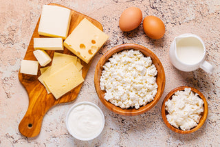 Picture of foods high in calcium including eggs and cheese.