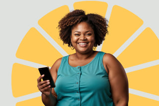 Woman holding a phone with a yellow sunburst design on a gray background