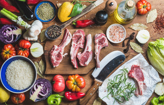 Picture of foods high in iron including mea, tonatoes, and rice