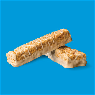 2 salted toffee pretzel protein bars on blue background - bariatric protein supplements - celebrate vitamins
