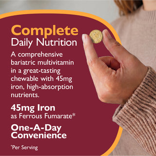 Multivitamin supplement being held by a hand with promotional text on a maroon background